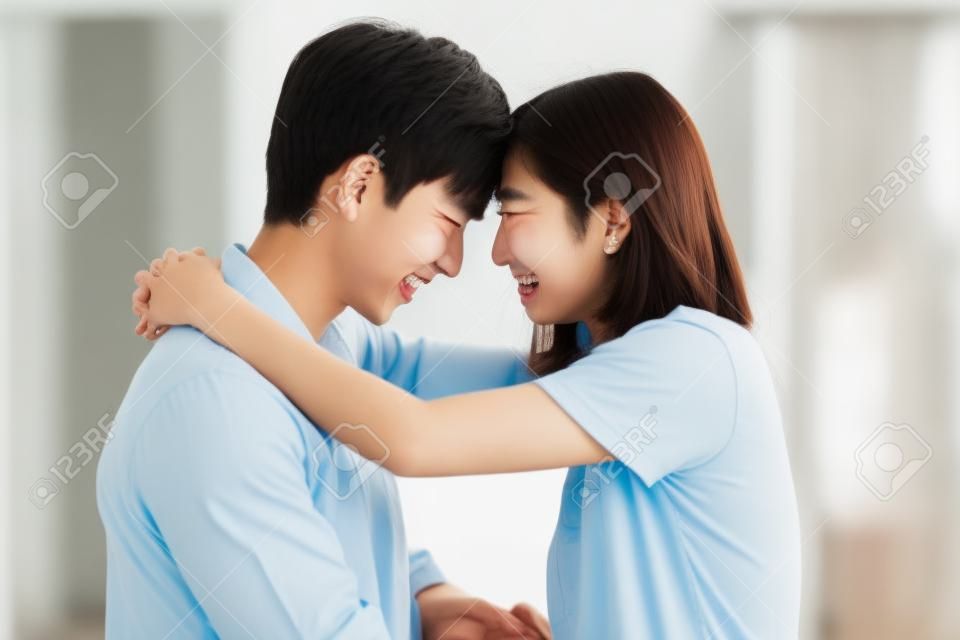 image of young asian couple emotionally happy