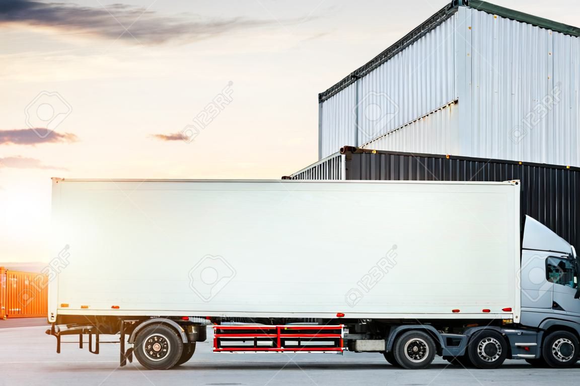 Container Truck on The Parking Lot at Warehouse. Container Tractor Truck. Trucking. Shipping Lorry Diesel Trucks. Freight Truck Logistics, Cargo Transport