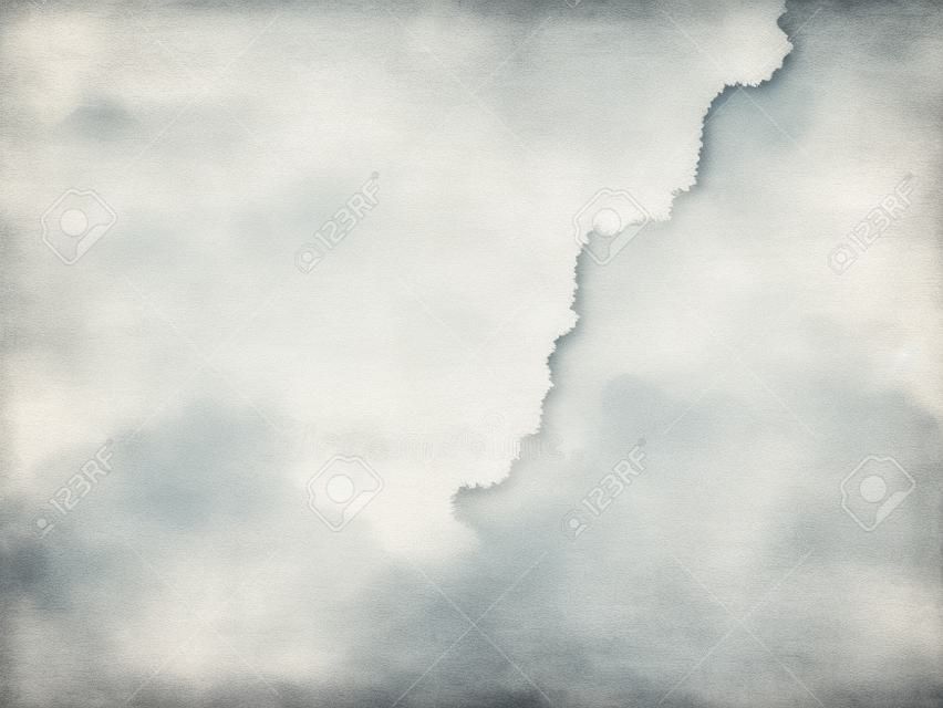 在柔和的淡水彩畫灰色的天空紋理背景復古