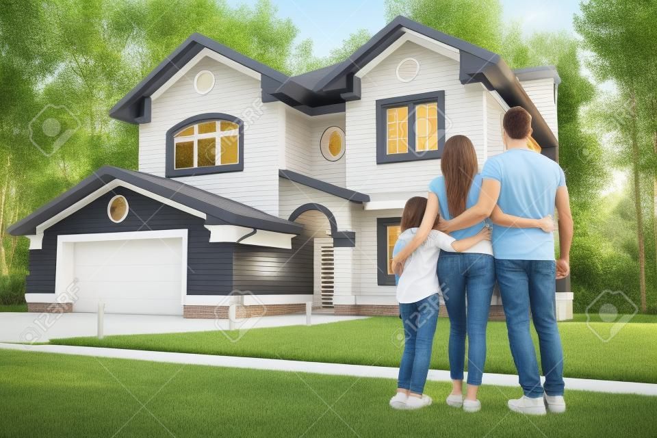 Back view of happy family is standing near their modern house and hugging