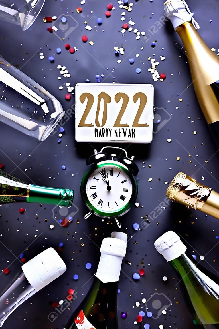 Happy New Year greeting card, 2022 with champagne, confetti