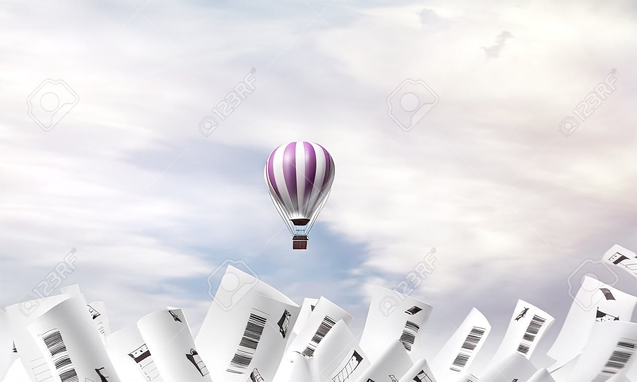 Colorful aerostat flying among paper documents and over the blue cloudy sky. 3D rendering.