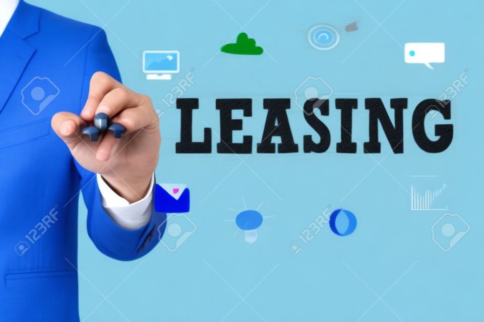 LEASING Businessman drawing Landing Page on blurred abstract background