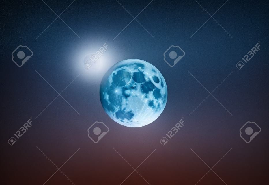 Full moon in the dark sky