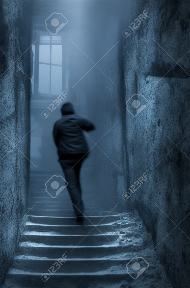 alone person walking in ruins