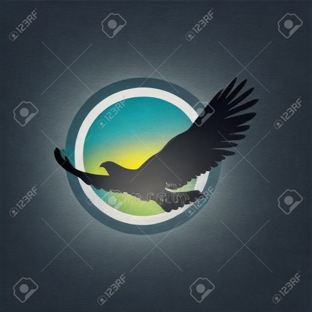 Simple and unique flying bird or eagle with moon or sun behind image graphic icon logo design abstract concept vector stock. Can be used as symbol related to animal or freedom