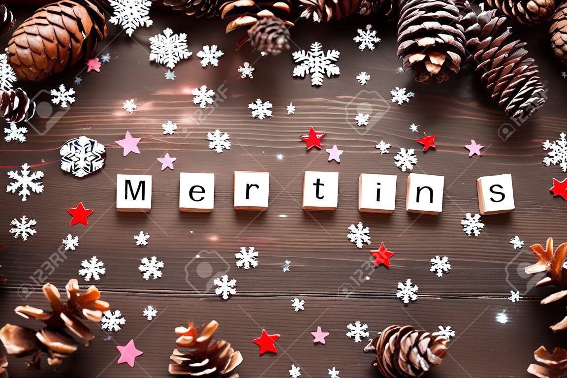 Rustic wooden background with pine cones. Merry Christmas background with bright snowflake confetti.