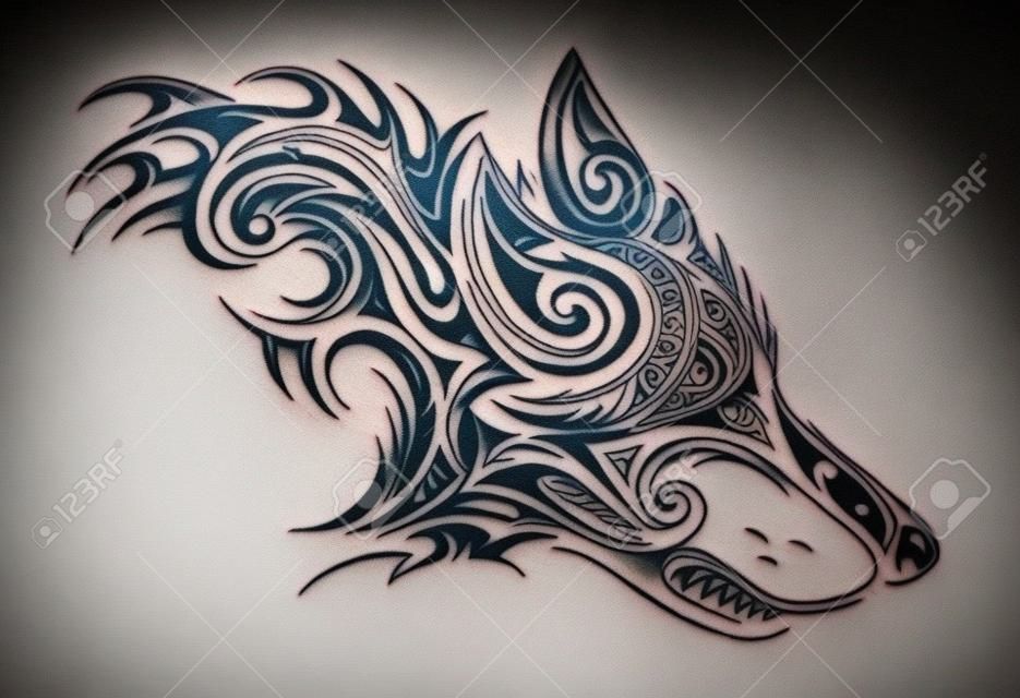 Tribal style wolf head tattoo