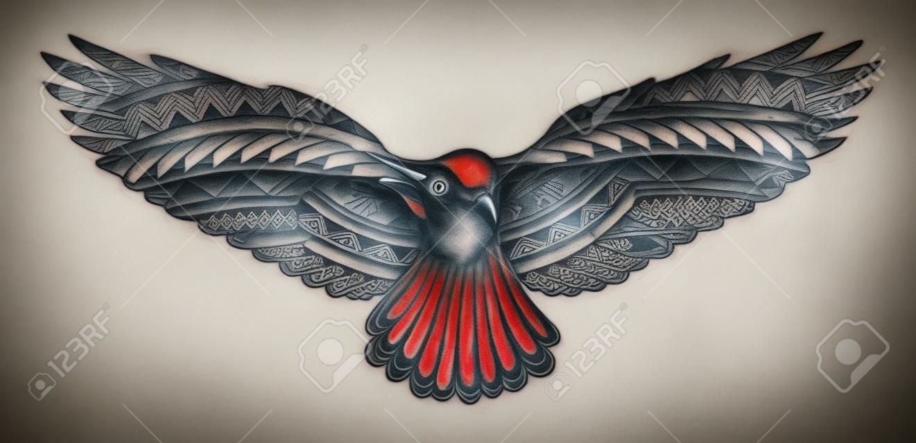 Crow tattoo with Maori style ornaments