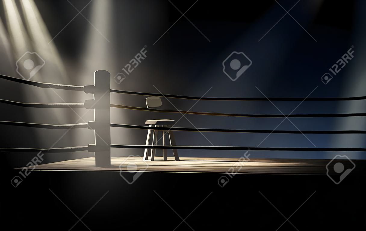 Une vue spectaculaire sur le coin d'un vieux ring de boxe vintage avec un tabouret spotlit vide par un seul coup de projecteur sur un fond sombre isolée