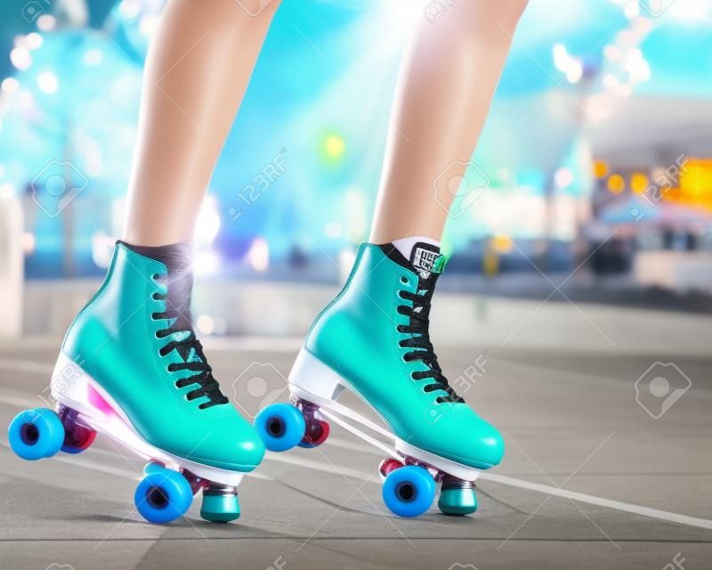 Bright close-up Of Legs Wearing Roller Skating Shoe. Outdoors.