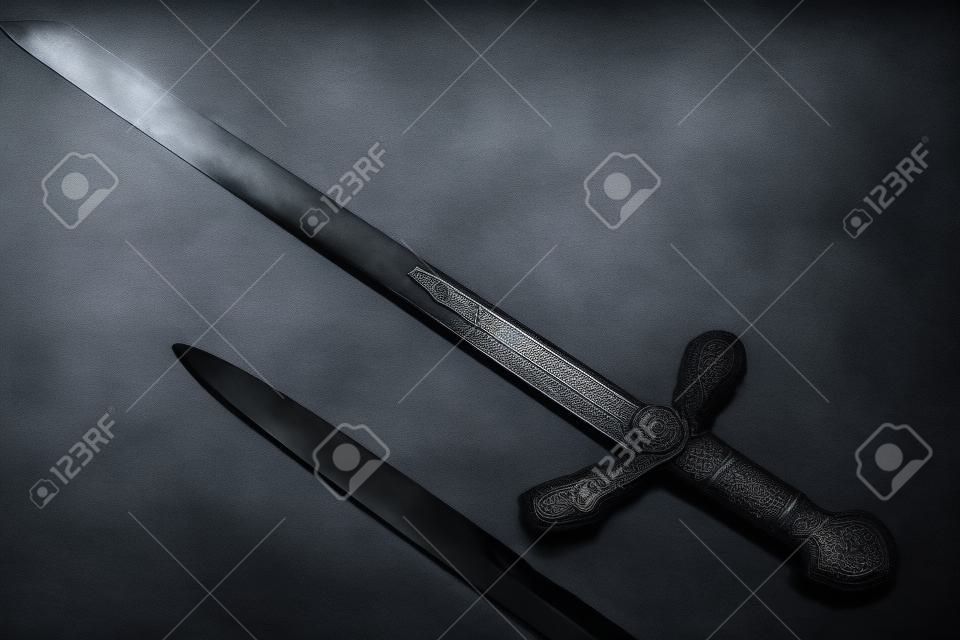 Knightly swords on a gray background