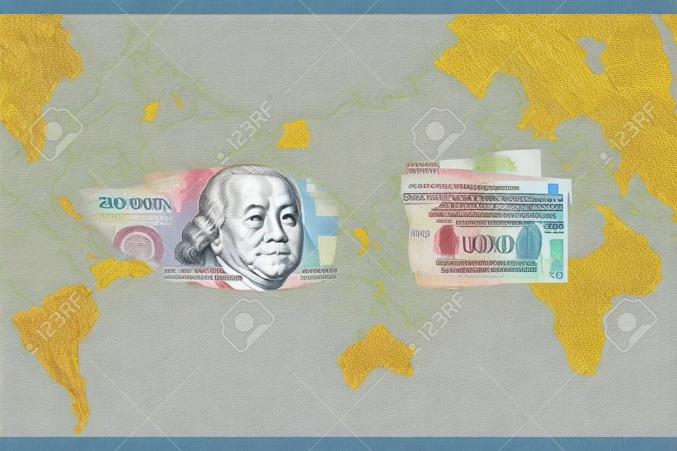 미국과 중국의 경제 관세 무역 전쟁 위기를 상징하는 세계 지도에 있는 미국 달러와 위안화 지폐. 복사 공간 및 그림입니다.