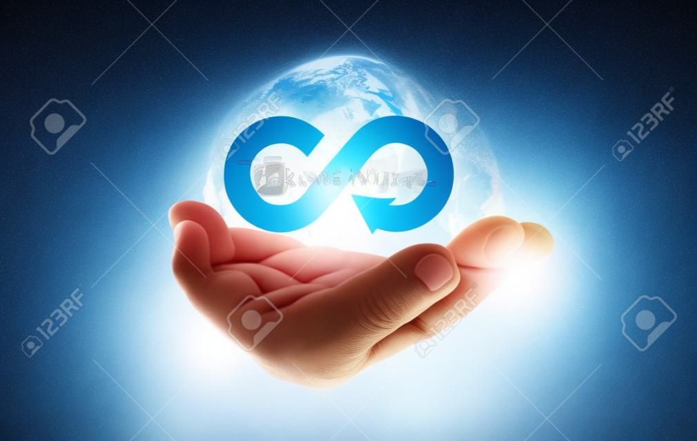 Hand holding infinity sign symbol for circular economy and business growth unlimited by , future together sustainable development business and environment concept.