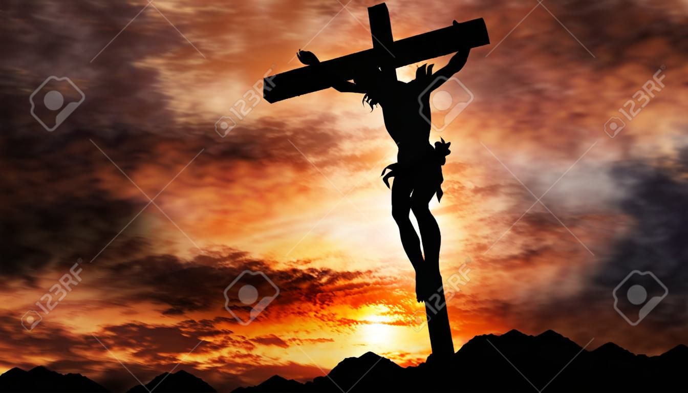 Jesucristo crucificado en la cruz en la colina del Calvario con el cielo en llamas en segundo plano.