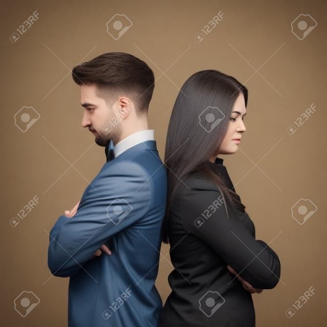 Angry couple turning their back on each other