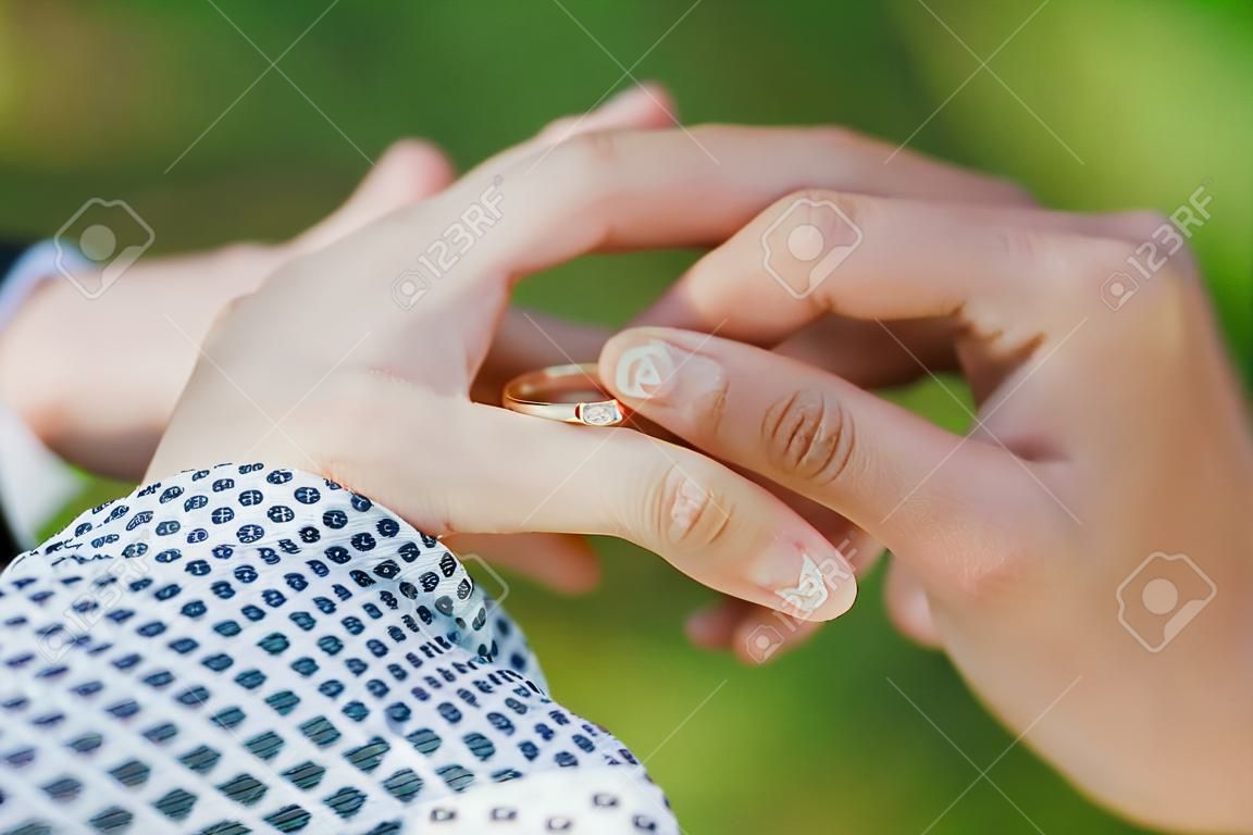 Newlyweds exchange rings on their wedding day