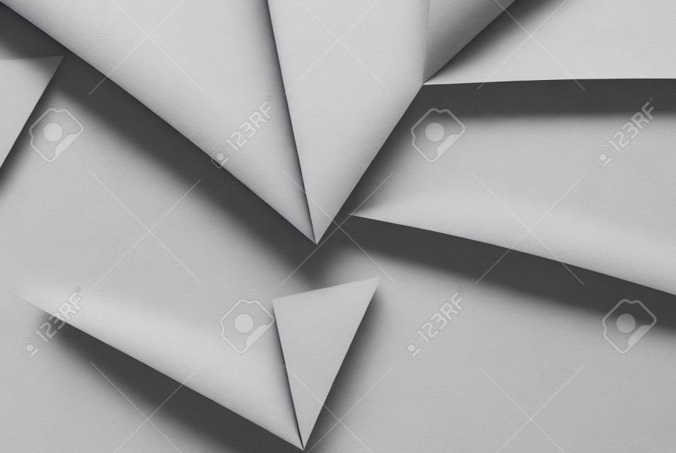 Geometryczne kształty wykonane z szarego papieru abstrakcyjnego