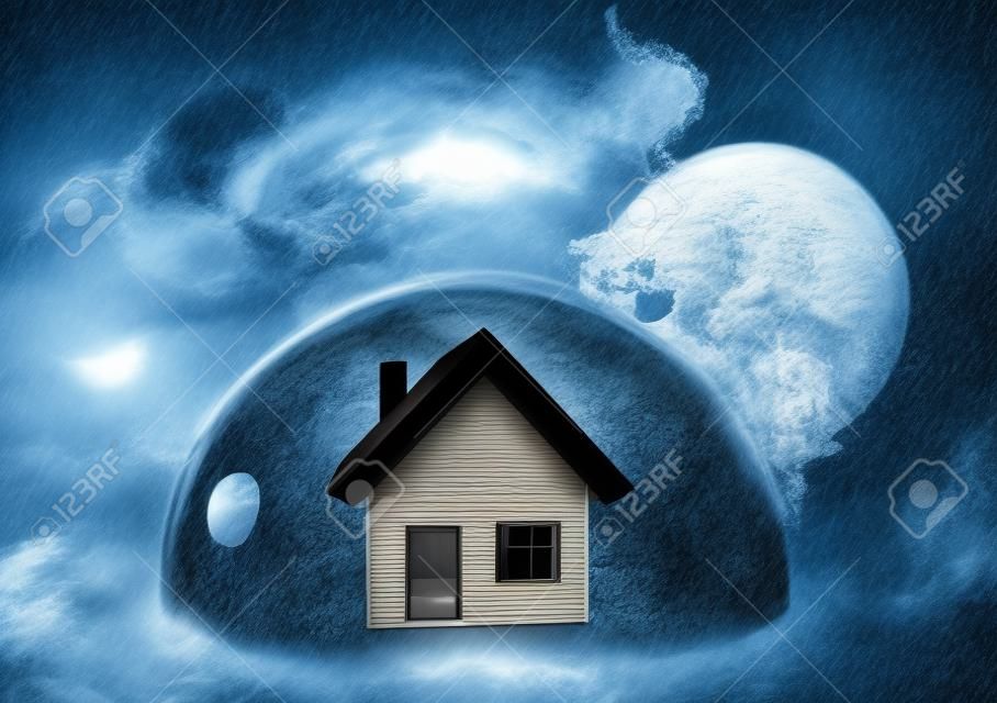 House safely inside a shield dome during a storm that protects it from a wrecking ball. Protection and safety concept