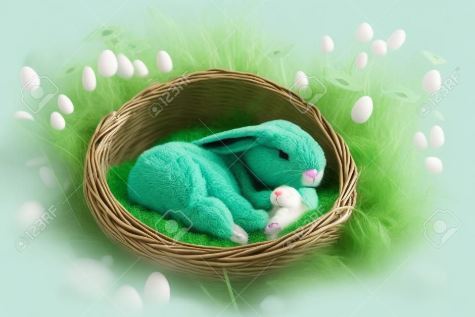 Cute little easter bunny sleeps in basket in green clearing