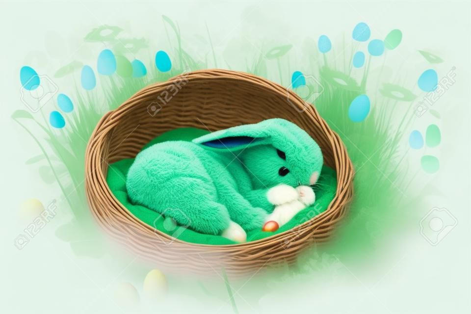 Słodki mały zajączek śpi w koszyku na zielonej polanie