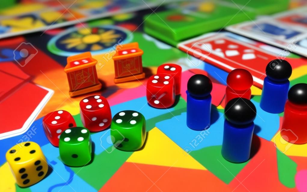 Games and dices, playcards, figurines and symbols. Casual leisure gaming.
