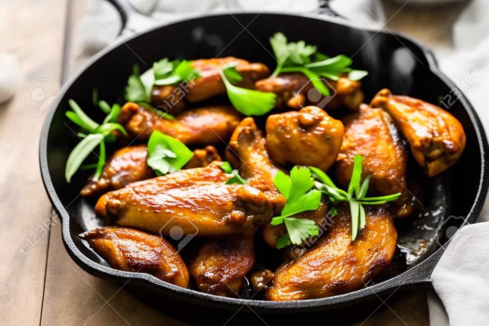 Chicken wings in cast iron skillet