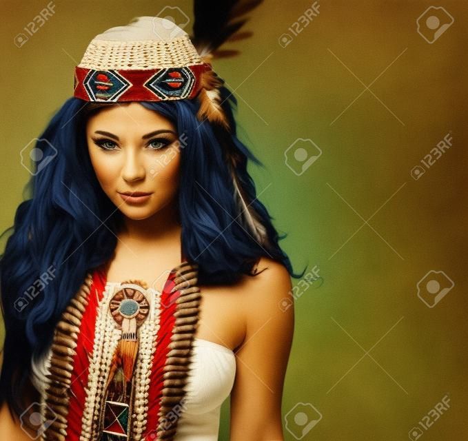 Young woman in costume of American Indian 
