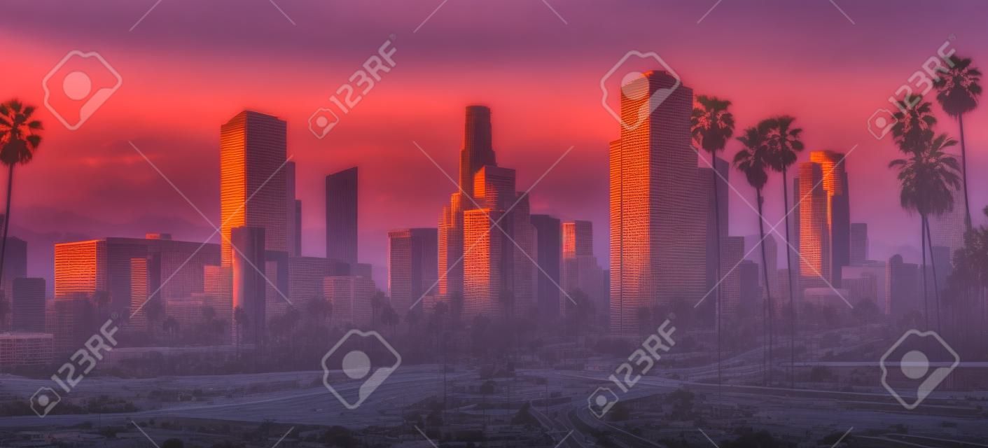 the skyline of los angeles during sunrise