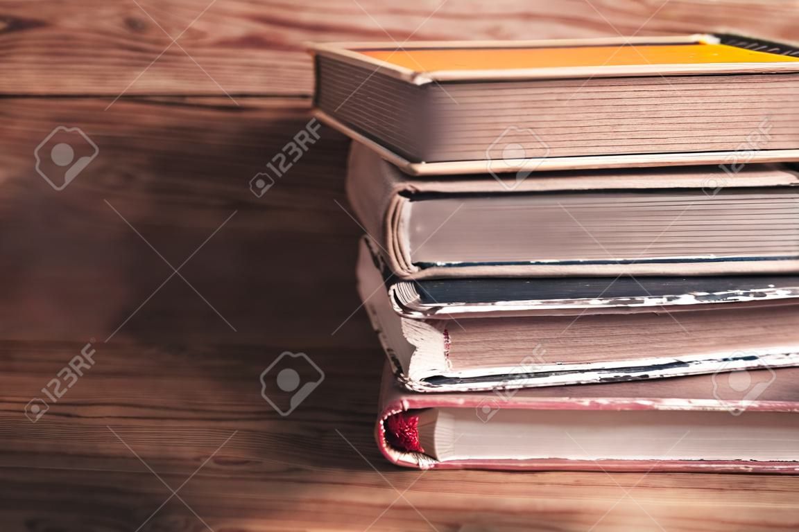 Books on wooden desk. Education