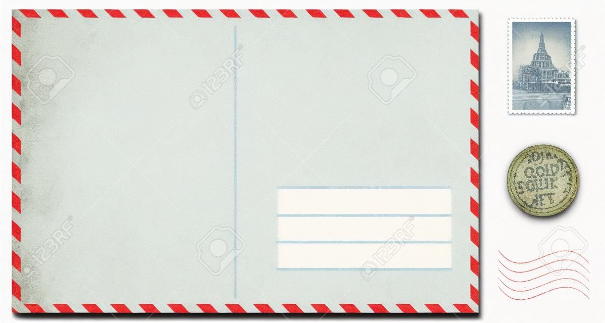 oude blanco ansichtkaart geïsoleerd op wit met postzegels ingesteld