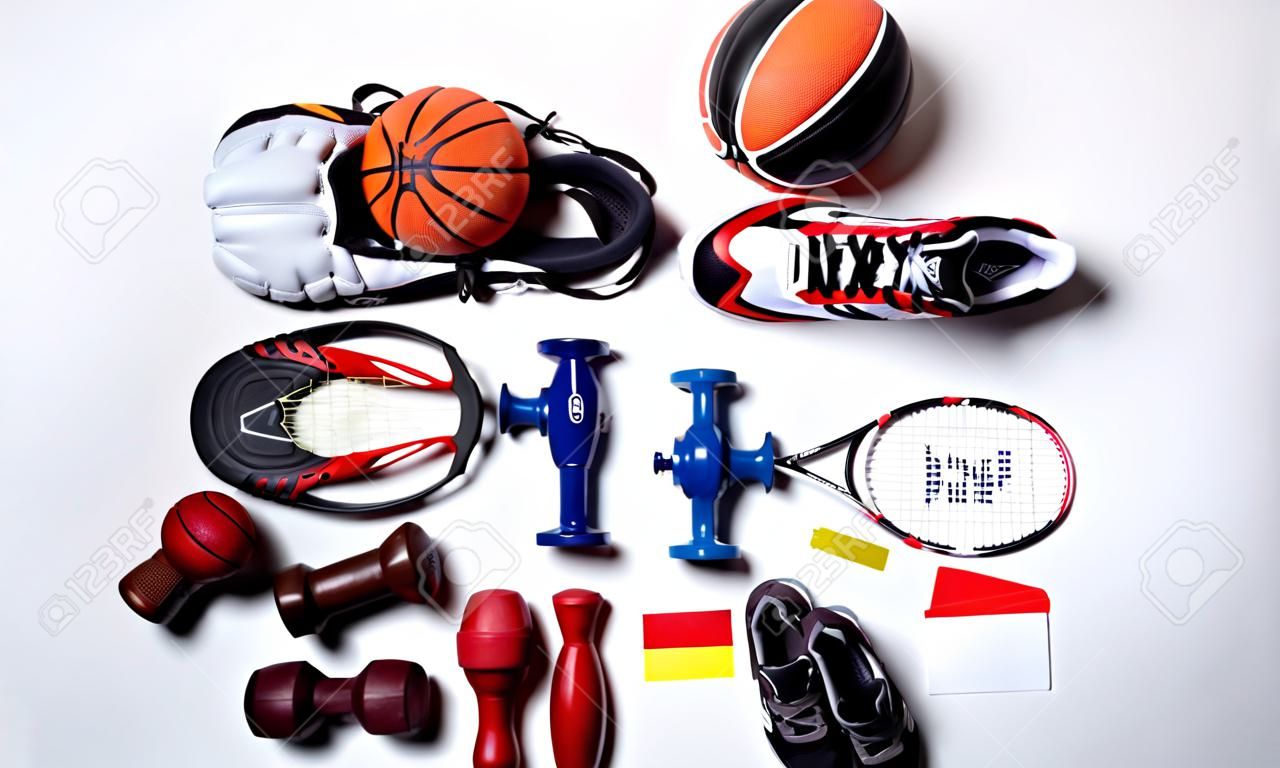 High Angle View Of Various Sport Equipment On White Background