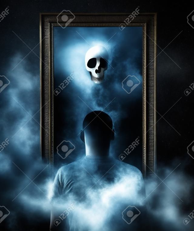 Mirror. Terrible ghost on dark smoke background