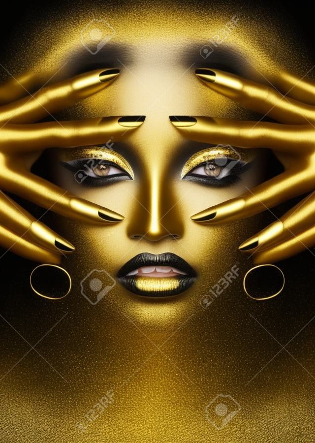 Beauty woman black skin color body art, gold makeup lips eyelids, fingertips nails in gold color paint. professional gold makeup