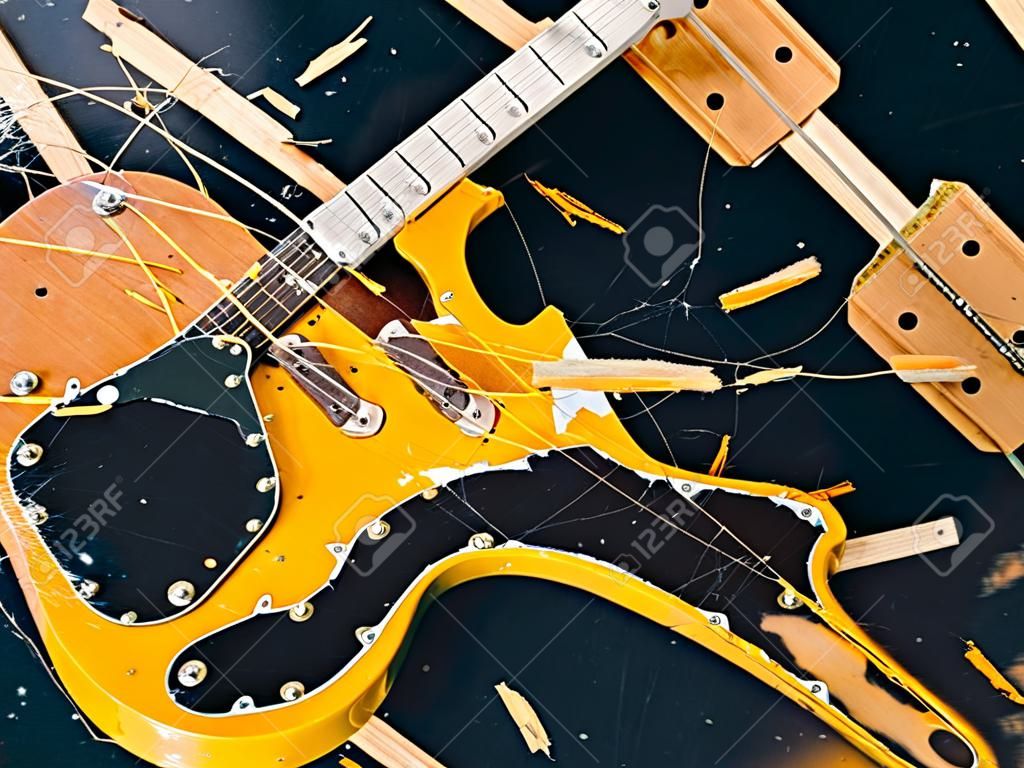 Old broken electric guitar, falling to pieces.