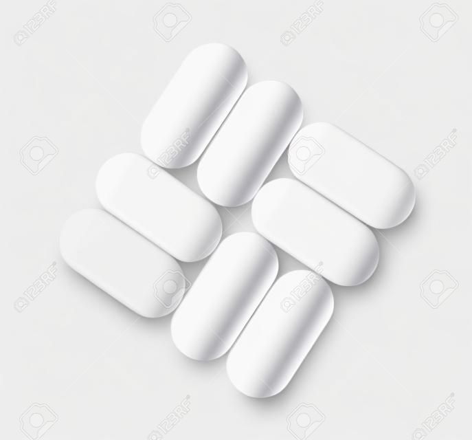 White oval pills isolated on white background