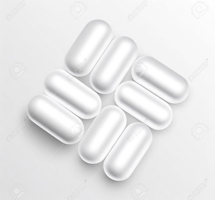 White oval pills isolated on white background