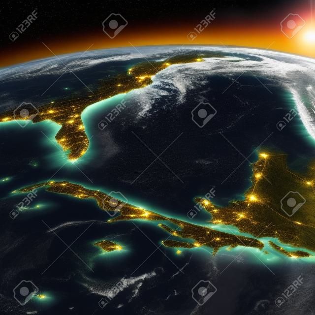 매우 상세한 지구입니다. 빛나는 도시의 불빛이 비치는 밤이 길을 가르쳐줍니다. 밤낮의 경계. 카리브해 제도. 쿠바, 아이티, 자메이카. NASA가 제공 한이 이미지의 요소