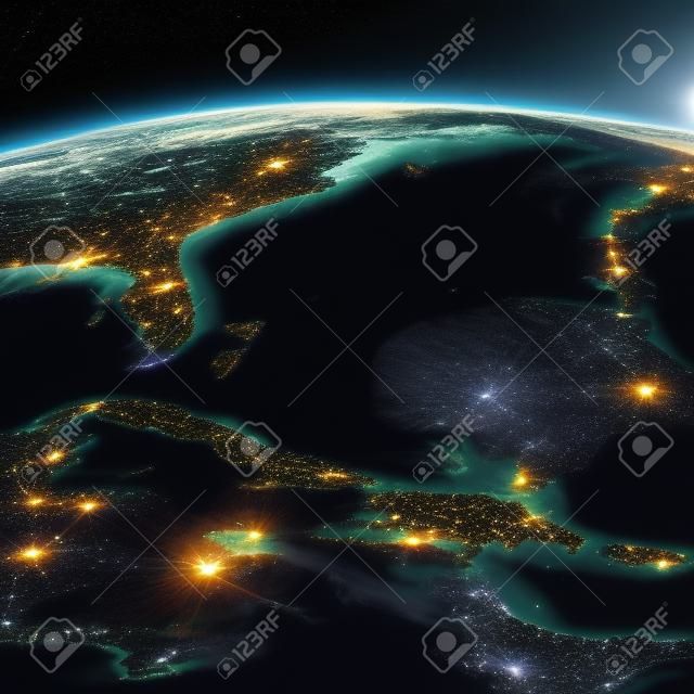 매우 상세한 지구입니다. 빛나는 도시의 불빛이 비치는 밤이 길을 가르쳐줍니다. 밤낮의 경계. 카리브해 제도. 쿠바, 아이티, 자메이카. NASA가 제공 한이 이미지의 요소
