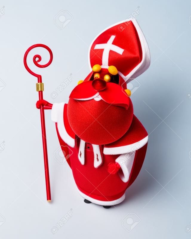 Święty Mikołaj Mikołaj lub Sinterklaas - szczęśliwy słodki na białym tle