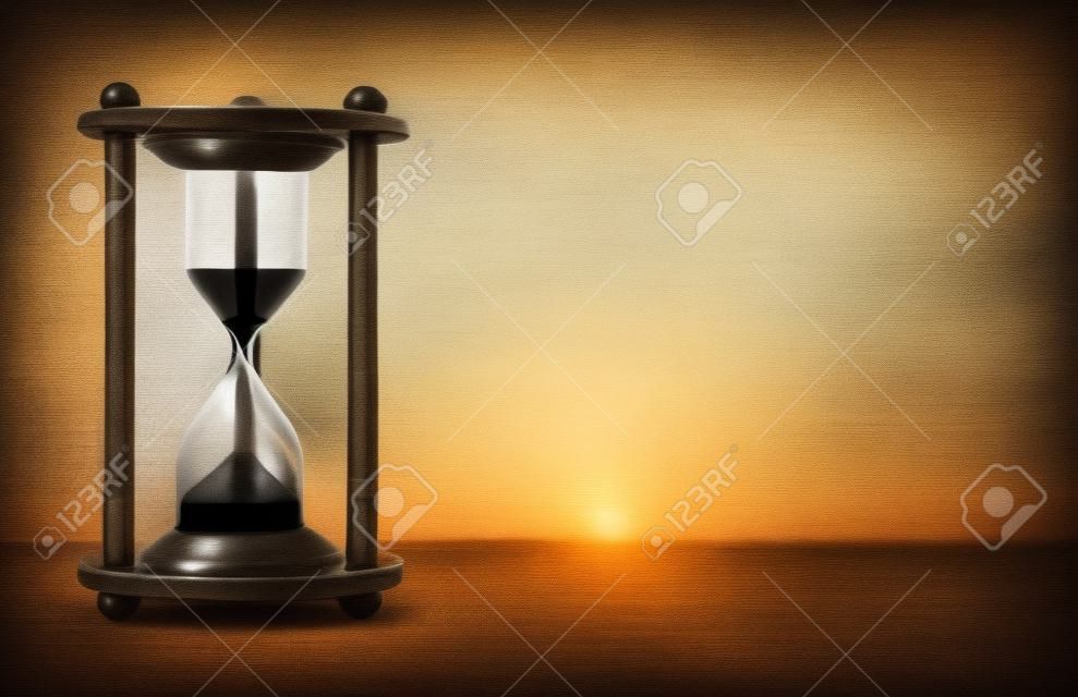 Hourglass with blur city at evening time. Beauty and past moments concepts with copy space. vintage style