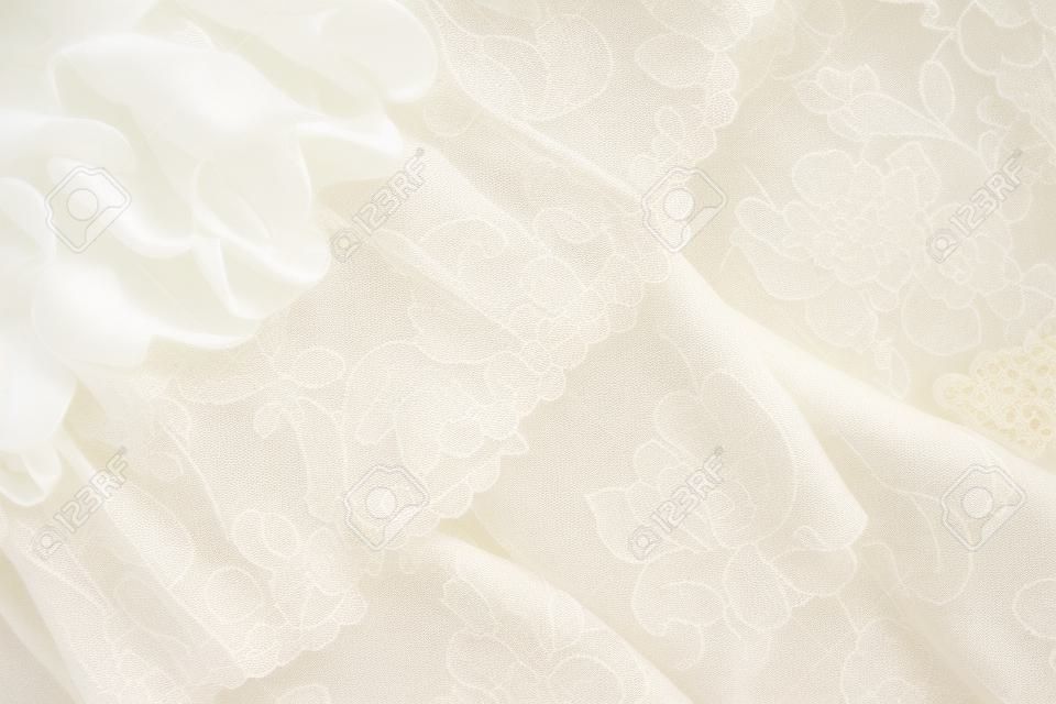 Closeup of white beige and ivory vintage lace fabrics