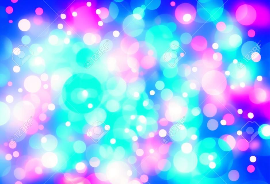 Beautiful pink blue bokeh background with shimmering colors of blue green pink and yellow and white lights.