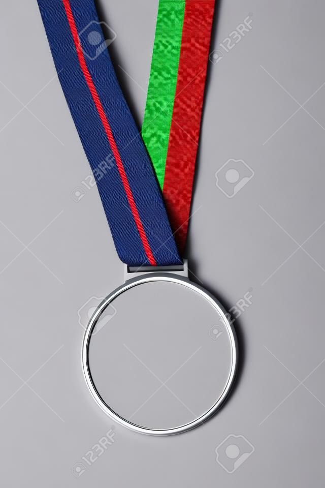 sports competition medal with red and blue isolated over white