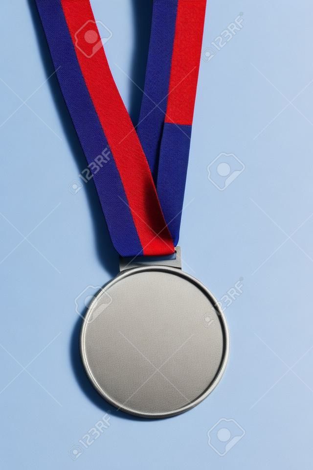 sports competition medal with red and blue isolated over white