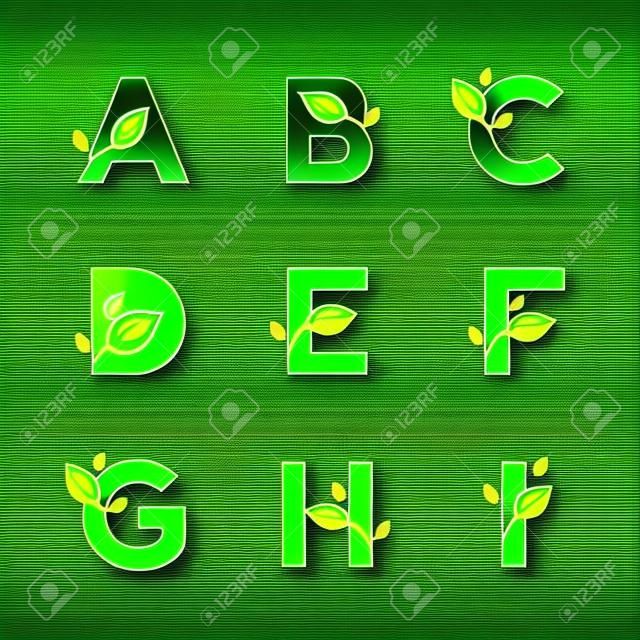 Векторный набор зеленых экологически писем с листьями. Экологический шрифт от А до I.