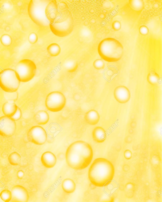 burbujas de champagne en un fondo dorado suave