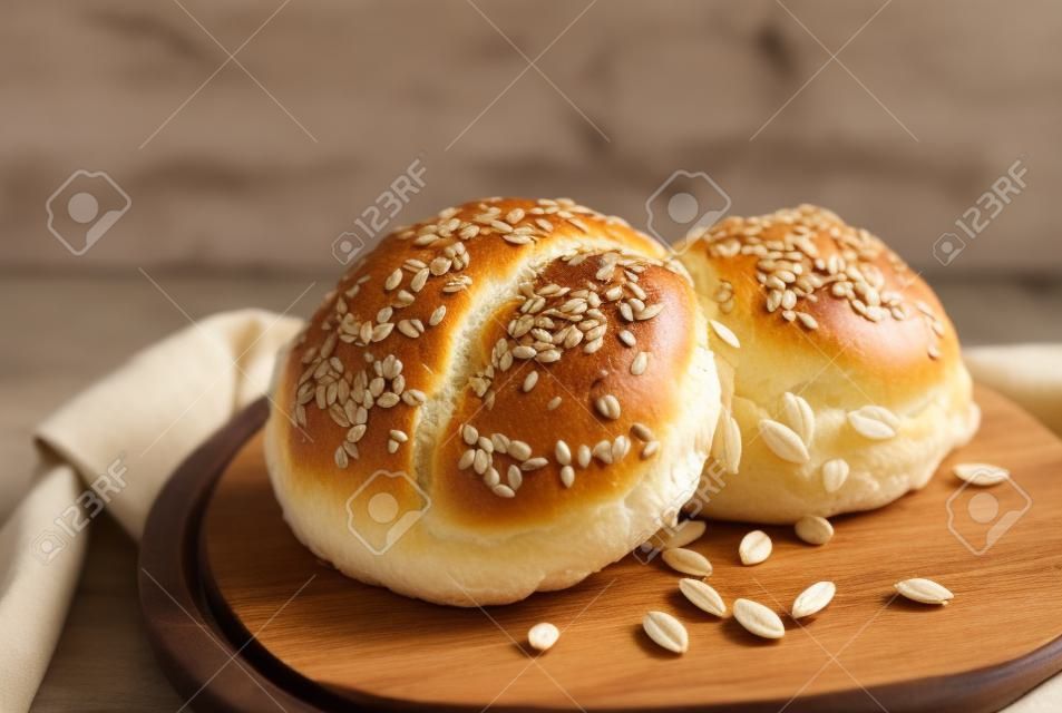 Multi grain bun on wooden tray