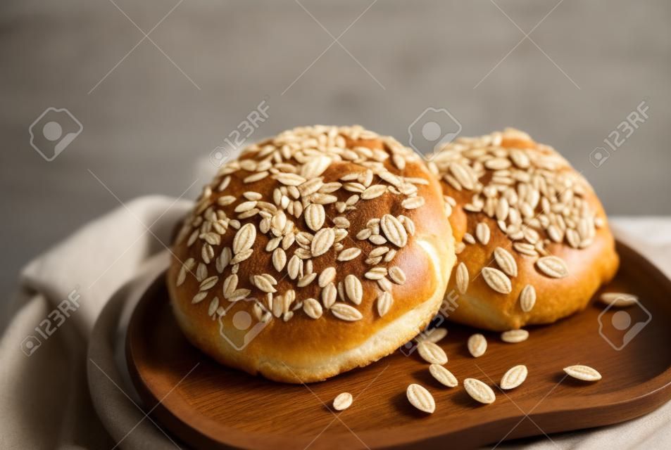 Multi grain bun on wooden tray