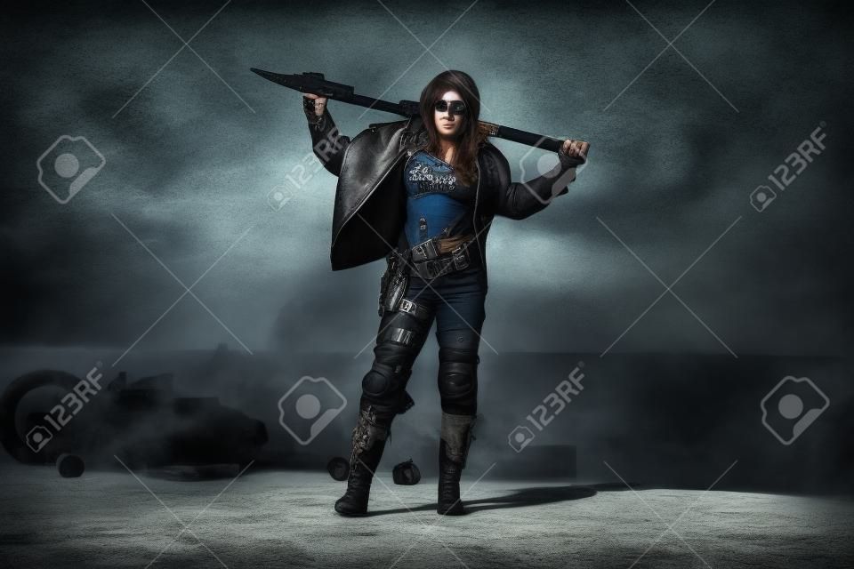 Post-apocalyptic biker woman with weapon outdoors.
